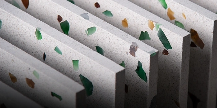 Terrazzo tiles with glass and marble aggregates